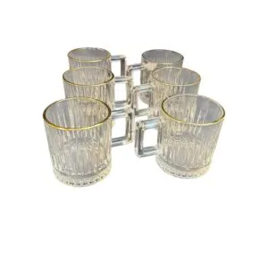 Tassen aus hellem Glas mit Goldrand und Riffeloptik